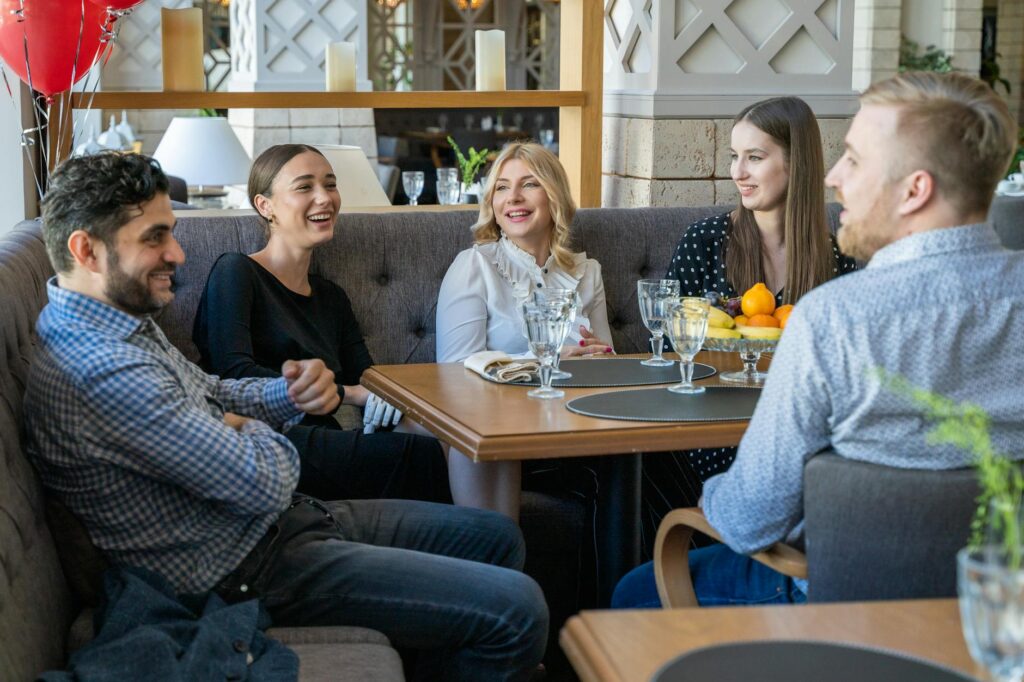 group of people having a meeting on a restaurant
