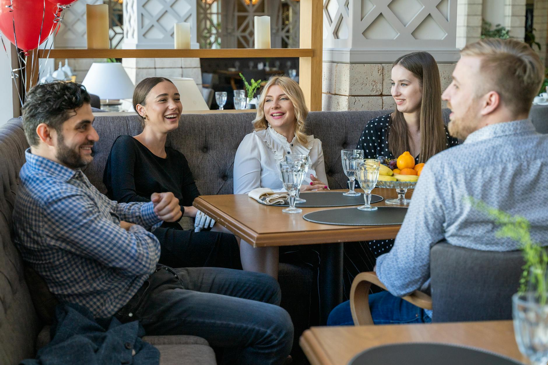 group of people having a meeting on a restaurant